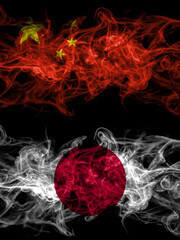 China, Chinese vs Japan, Japanese smoky mystic flags placed side by side. Thick colored silky abstract smoke flags.