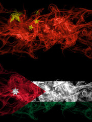 China, Chinese vs Jordan, Jordanian smoky mystic flags placed side by side. Thick colored silky abstract smoke flags.