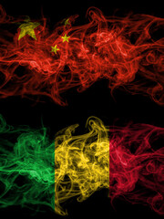 China, Chinese vs Mali smoky mystic flags placed side by side. Thick colored silky abstract smoke flags.