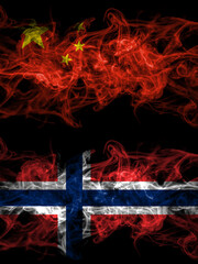 China, Chinese vs Norway, Norwegian smoky mystic flags placed side by side. Thick colored silky abstract smoke flags.