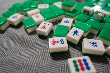 Many Mahjong tiles on the table