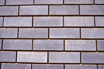 new gray brick wall. texture, pattern. close-up.