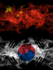 China, Chinese vs South Korea, Korean smoky mystic flags placed side by side. Thick colored silky abstract smoke flags.