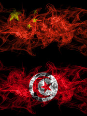 China, Chinese vs Tunisia smoky mystic flags placed side by side. Thick colored silky abstract smoke flags.