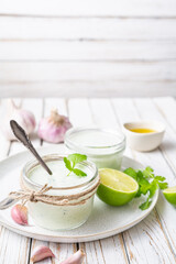 Cilantro garlic sauce with lime juice and olive oil