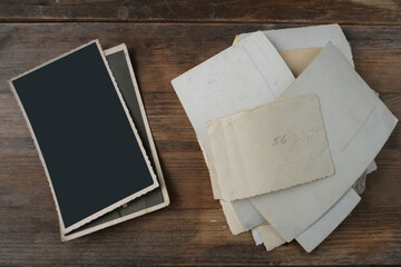 empty mock up background of old wood, set of vintage photos with blank, back side of the photo, concept family genealogy, memories, generational ties, museum historical materials
