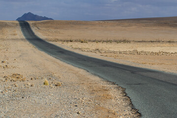 Endless road through the Namib desert