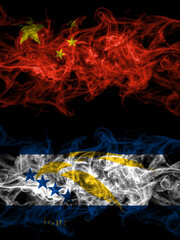 China, Chinese vs United States of America, America, US, USA, American, Johnston Atoll smoky mystic flags placed side by side. Thick colored silky abstract smoke flags.