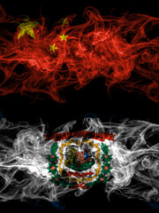 China, Chinese vs United States of America, America, US, USA, American, West Virginia smoky mystic flags placed side by side. Thick colored silky abstract smoke flags.