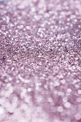 Background of abstract violet glitter lights. defocused