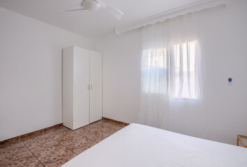 Modern and stylish room design, large bed with desk, business office area