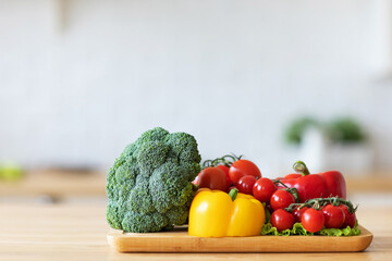 Vegetables on a cutting board in the kitchen.