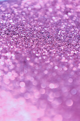 Background of abstract violet glitter lights. defocused