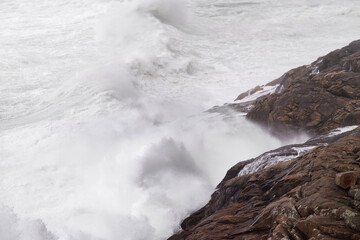 big ocean waves breaking  in atlantic ocean coast during sea storm 
