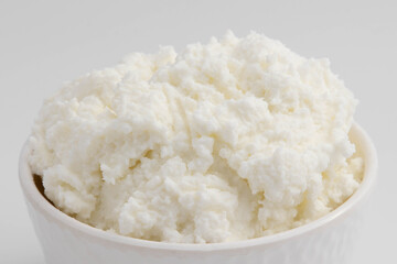 Detailed Closeup Of Freshly Churned White Butter Also Known As Safed Makhan Malai Or Homemade Makkhan In India Is Enjoyed With Breads Rotis Parathas And Sandwiches. White Background With Copy Space