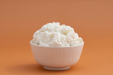 Natural Ayurvedic Freshly Churned White Butter Also Known As Safed Makhan Malai Or Makkhan Is Used For Skincare As Beauty Product And Has Multiple Health Benefits. Beige Background With Copy Space