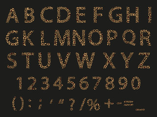 Set English alphabet with wild leopard skin on Capital Letter ABC, Number 9- 0 and Symbol,Vector English letters A to Z with animal print isolated on black background,Creative type for card or banner © Anchalee