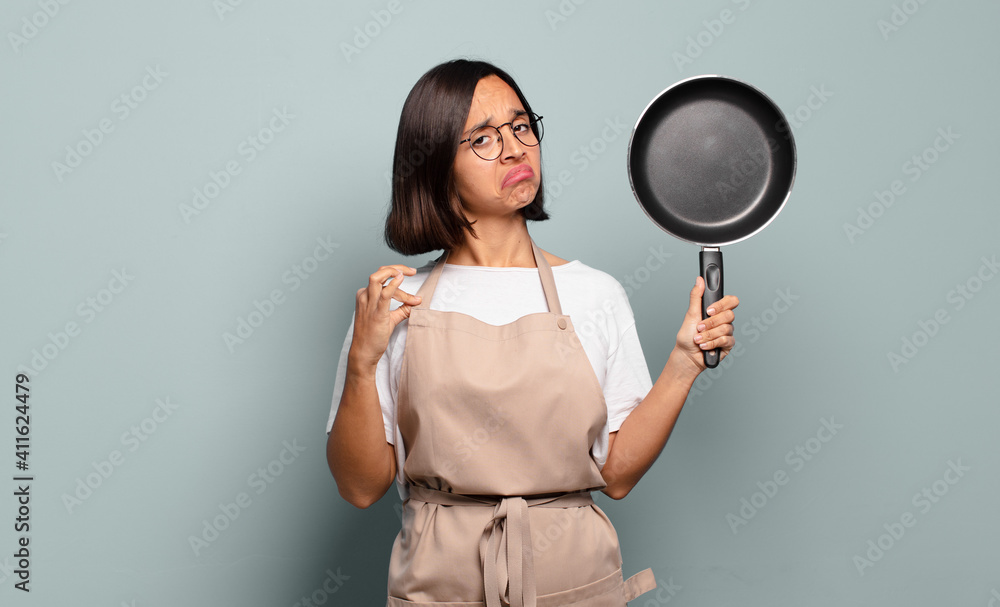 Canvas Prints young hispanic woman looking arrogant, successful, positive and proud, pointing to self