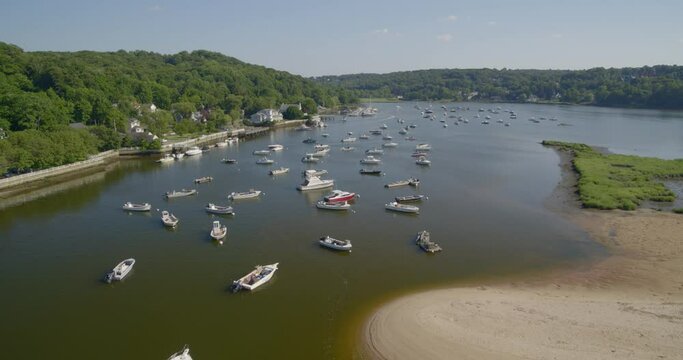 Forward Aerial Pan of Boats Anchored on Cold Spring Harbor