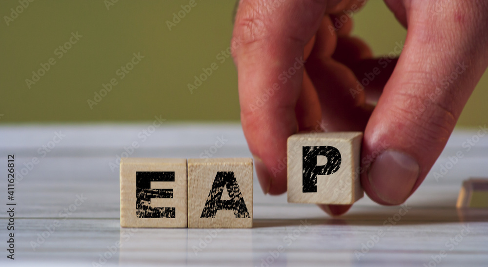 Poster cube block with the inscription eap. employee assistance program eap