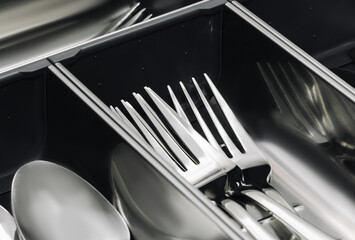 Stainless steel Kitchen utensil cutlery drawer organizer tray with simple set of tools, spoons and...