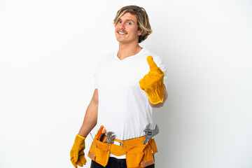 Young electrician blonde man isolated on white background doing coming gesture
