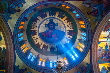 Fototapeta na wymiar Santorini, Stained glass windowed ceiling dome in Greek Cathedral in Fira, Greece
