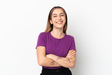 Obraz premium Young caucasian woman isolated on white background keeping the arms crossed in frontal position