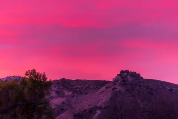 Fototapete Pink Sonnenuntergang über den Bergen  © Chris Wayne