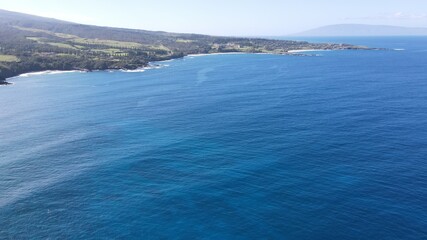 Fototapeta premium Aerial views of Lipoa point in West Maui during a winter swell