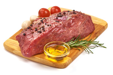 Raw beef meat with spices on cutting board, isolated on white background