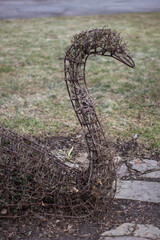 the figure of a swan made of wire 