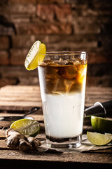 Dark n Stormy highball cocktail served as a long drink with rum, fresh lime juice, and ginger beer