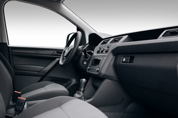 Modern SUV car interior with the leather panel, multimedia, and dashboard, at the isolated...