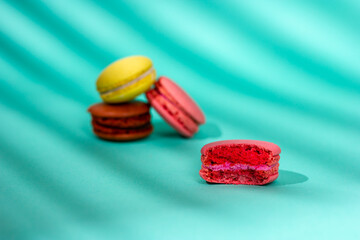 Colored french almond flour macaroons. Bitten macaroon