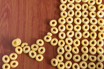 Top view of honey cereals. Close up view of corn flake cereal, a healthy and nutritious breakfast