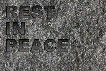 Rest In Peace etched in bold, dark gray text on black granite.