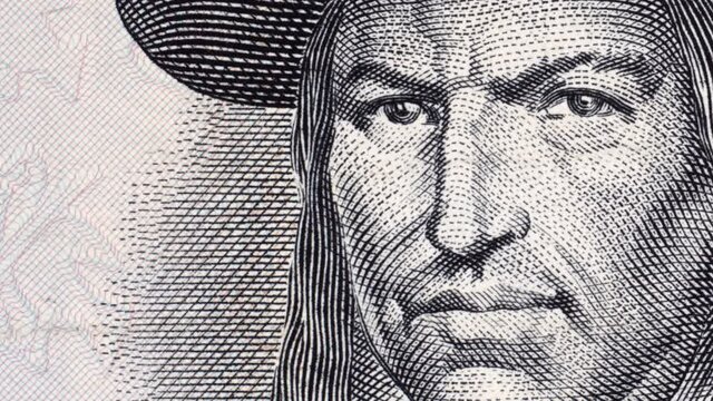 Tupac Amaru II portrait on Peruvian vintage banknote tracking, leader of indigenous rebellion against the Spanish in colonial Peru. Slider shot