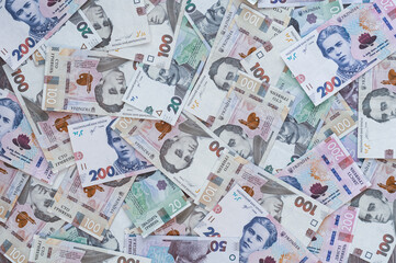 Paper money different denominations, Ukrainian hryvnia in denominations 50,100, 200 hryvnias, new money