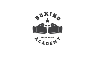 boxer academy logo with boxing gloves symbol