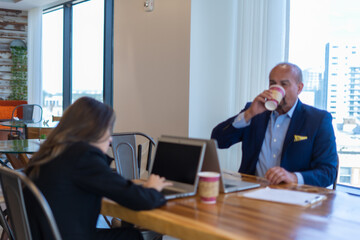 Office employees having a meeting