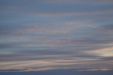 Obraz premium Beautiful sunset sky with clouds. View from the window.