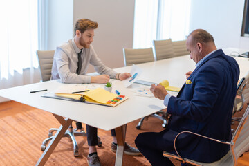 Office employees having a meeting