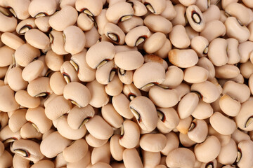 Blackeye beans on jute yarn fabric background