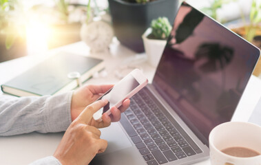 Woman hand using smartphone to do work business, social network, communication.