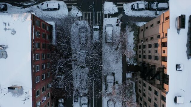 flying over empty snow covered street in Carroll Gardens Brooklyn