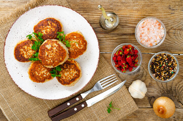 Homemade meat cutlets on wooden table. Studio Photo