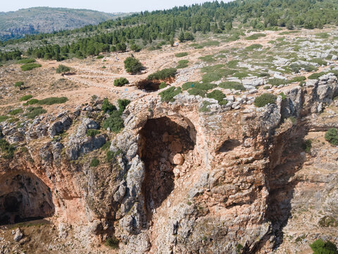 The Keshet  Cave - ancient natural limestone arch spanning the remains of a shallow cave with sweeping views near Shlomi city in Israel