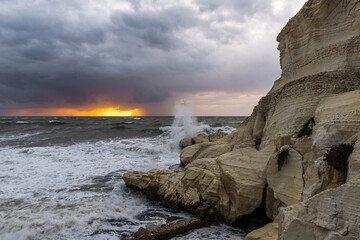 Stormy  weather in the evening at sunset on the Mediterranean coast near Rosh HaNikra in Israel
