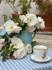 cup of coffee and roses